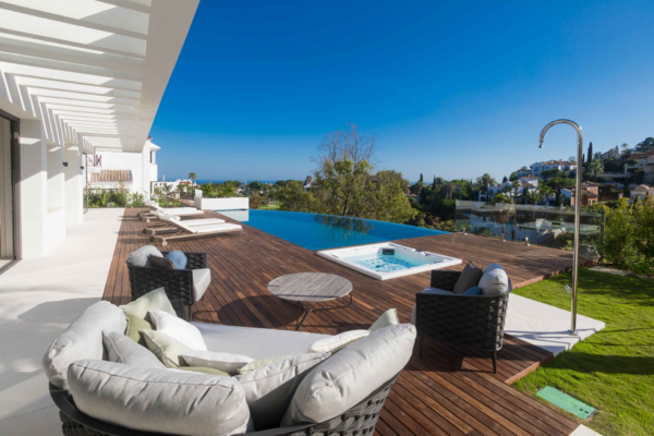 Contemporary five bedroom, south facing modern villa with the best panoramic sea and golf views.